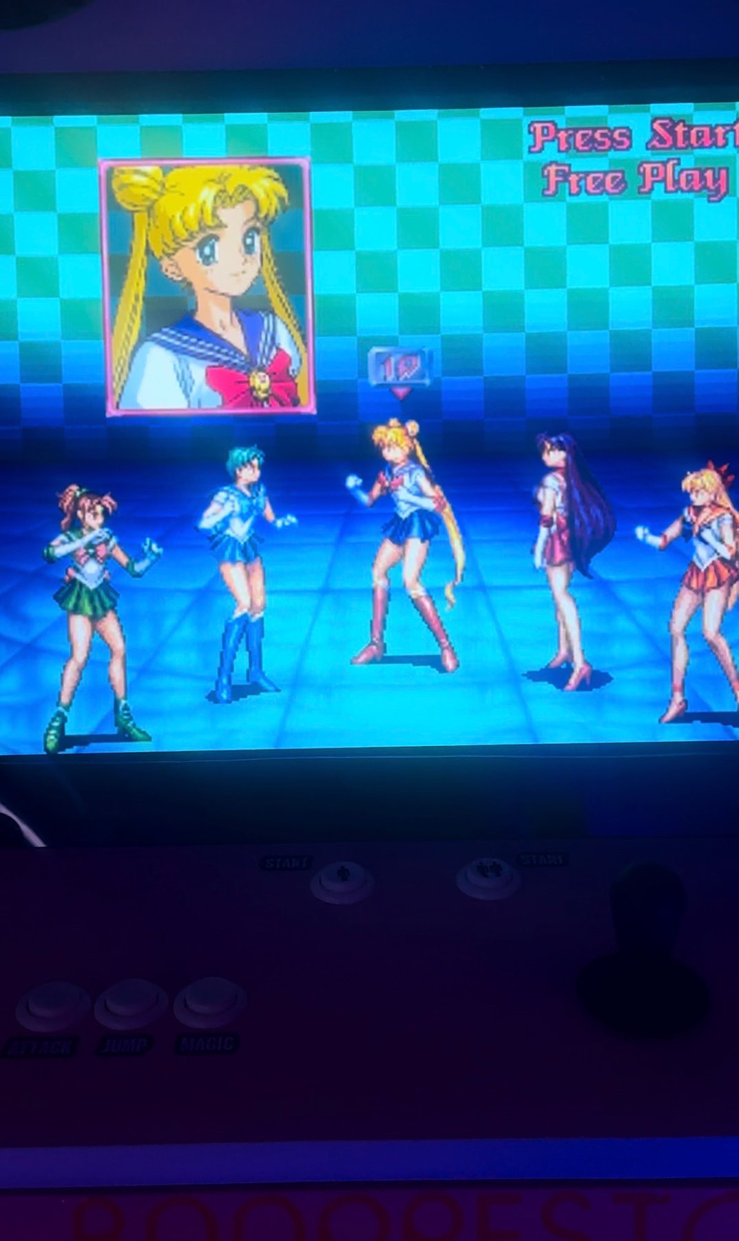 Sailor Moon character selection screen and controls on an arcade cabinet at Arcade Monsters San Diego.
